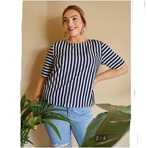 Navy blue and white stripped blouse with open back, lace insert piece.